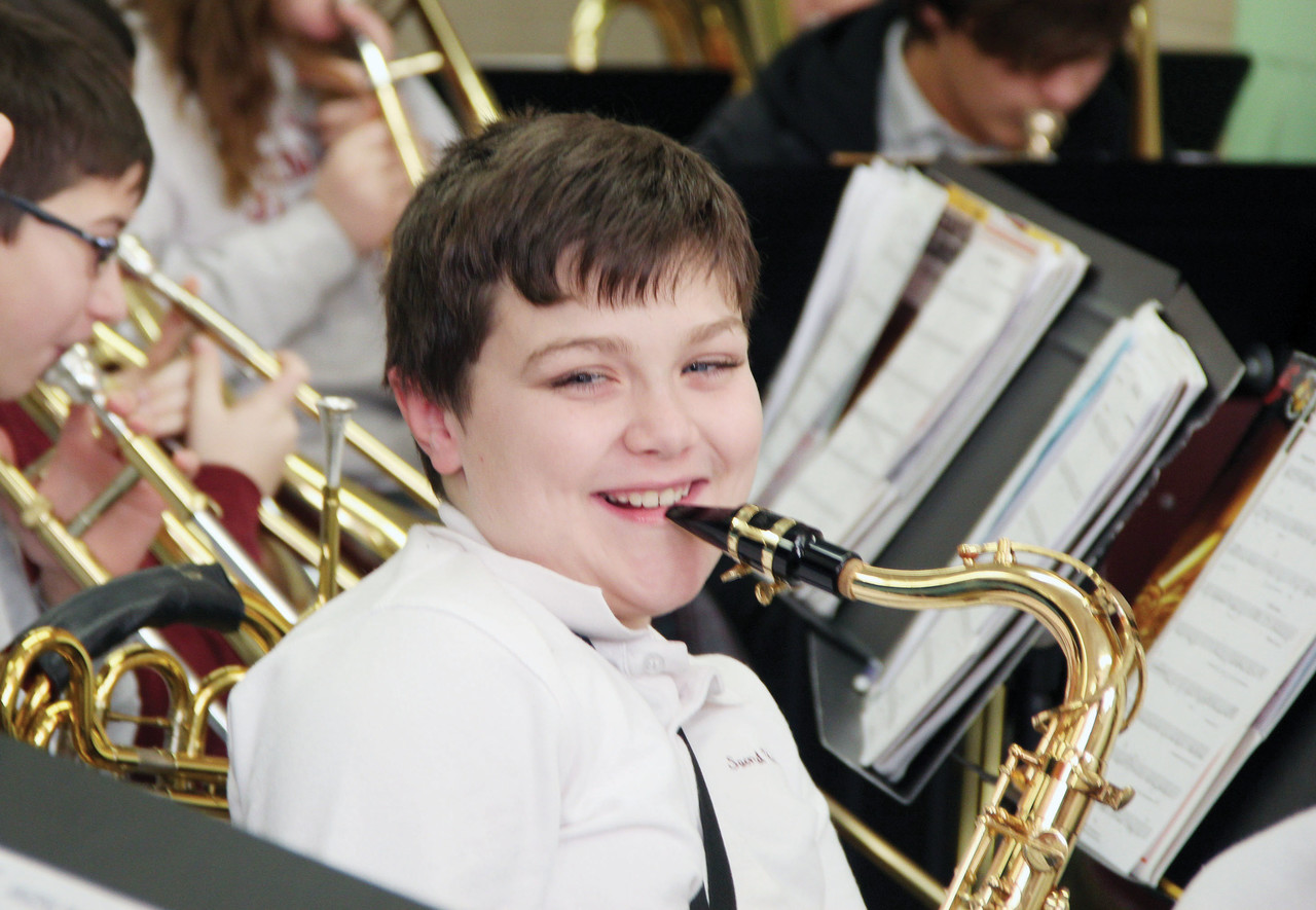 Fourth-grader Hunter Roman plays tenor saxophone in the Sacred Heart School Band.