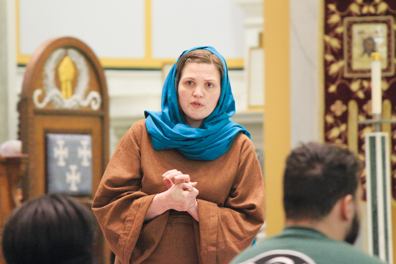 A BLESSED PERSPECTIVE: Liz Montigny, a parishioner at Holy Name of Jesus Parish in Providence portrays Mary in her one-woman show about the death of Jesus through the eyes of his loving mother.