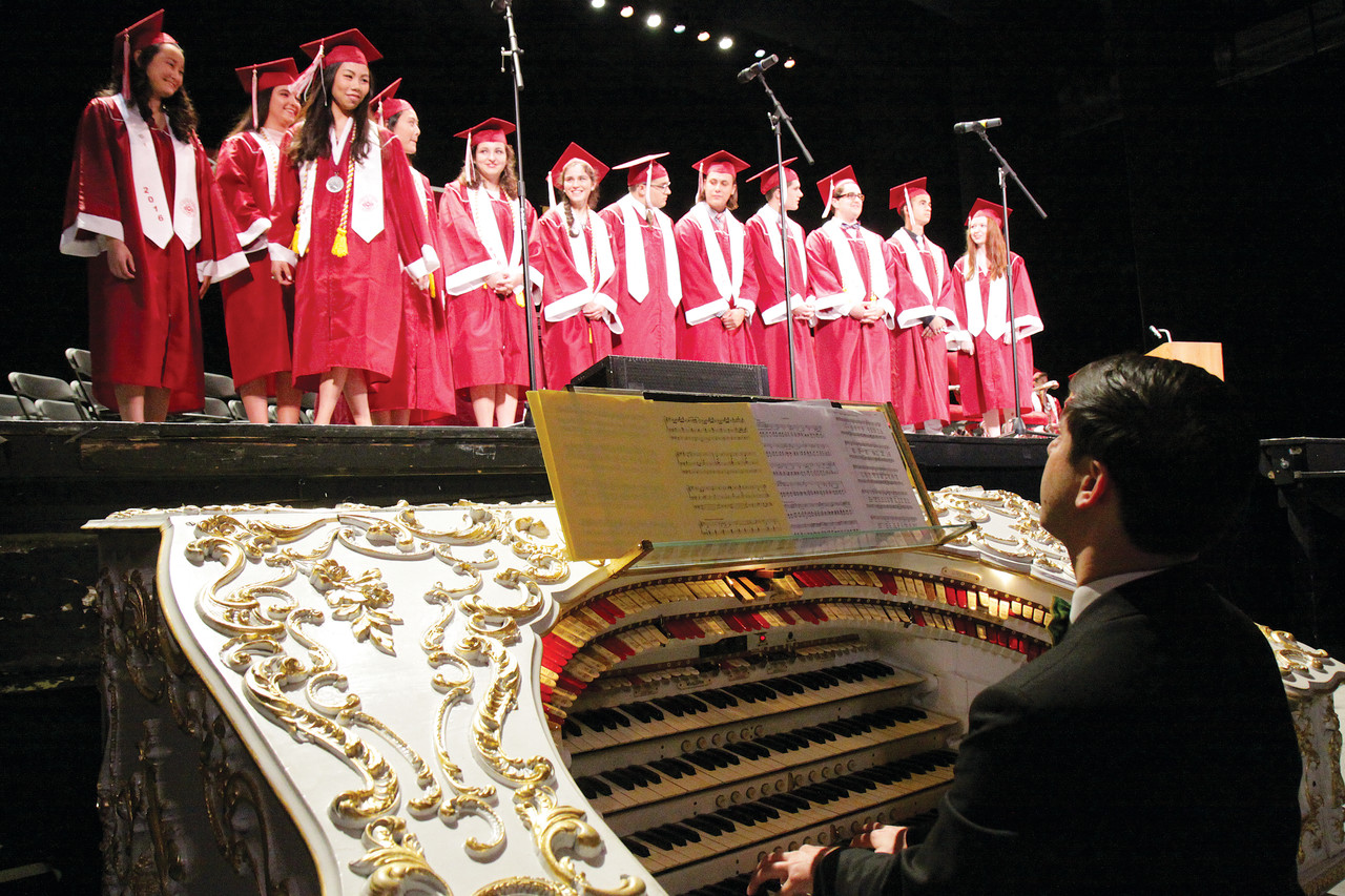 La Salle’s Honors Graduates briefly take the stage and receive applause from the crowd as “Pomp and Circumstance” is played on PPAC’s mighty Wurlitzer pipe organ.
