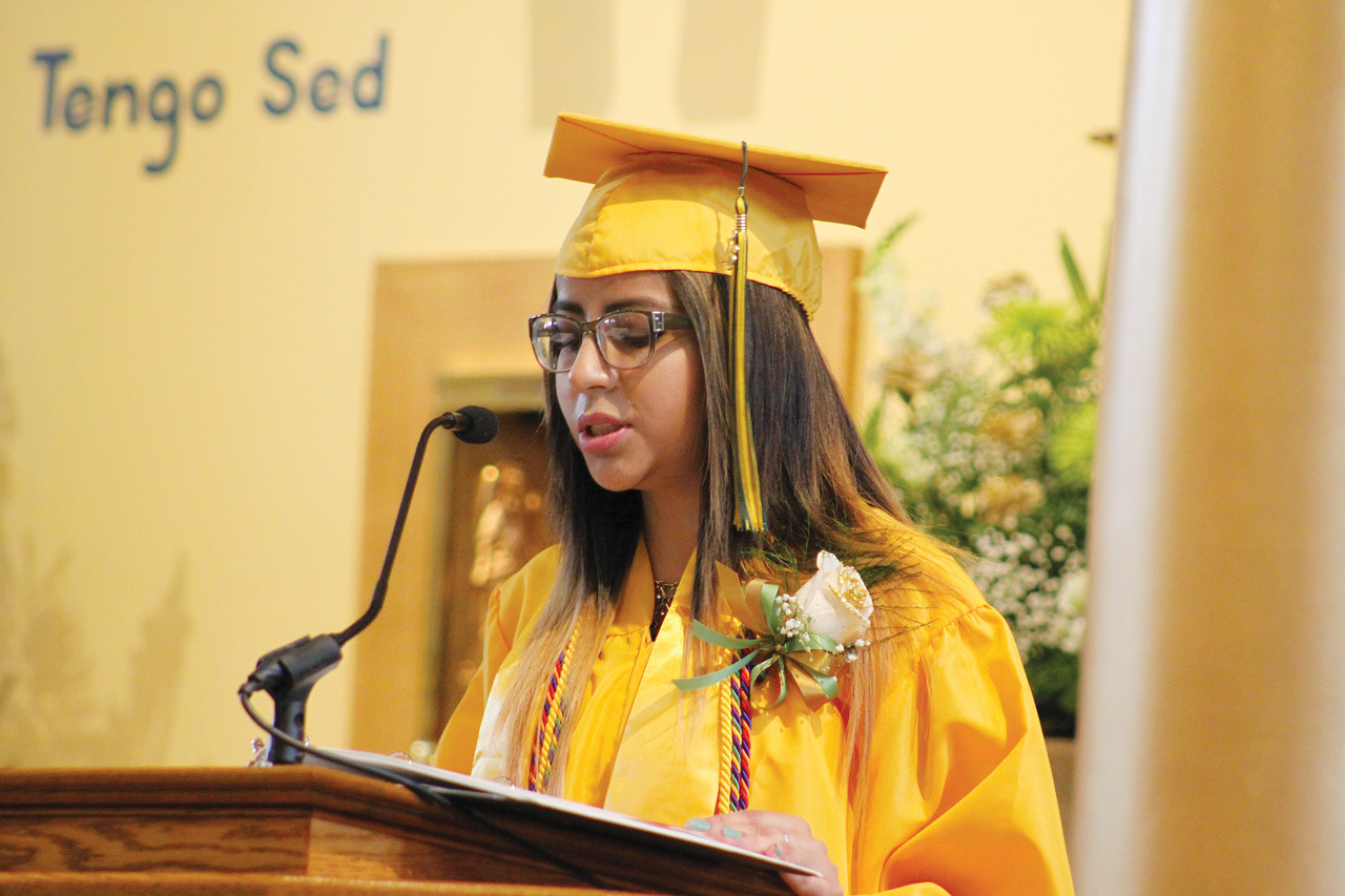 Valedictorian Paola Uriona addresses her fellow graduates.