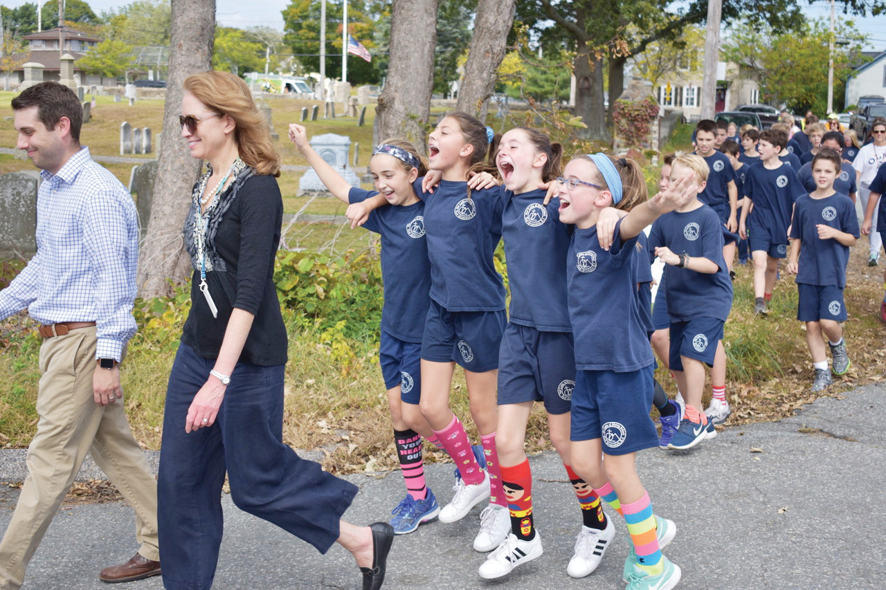 OLM School Students, faculty and parents enjoy the day during the school’s annual Walkathon on October 5.
