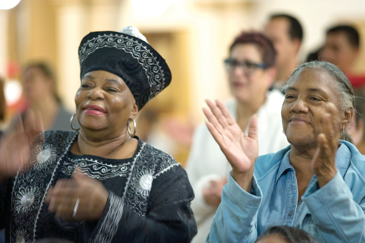 Worshippers clap and sing on the second evening of an African-American Catholic revival celebration Feb. 6 at St. Rita's Catholic Church in San Diego. The revival was organized by San Diego's Diocesan Commission for African American Catholics as part of Black History Month, observed every February.