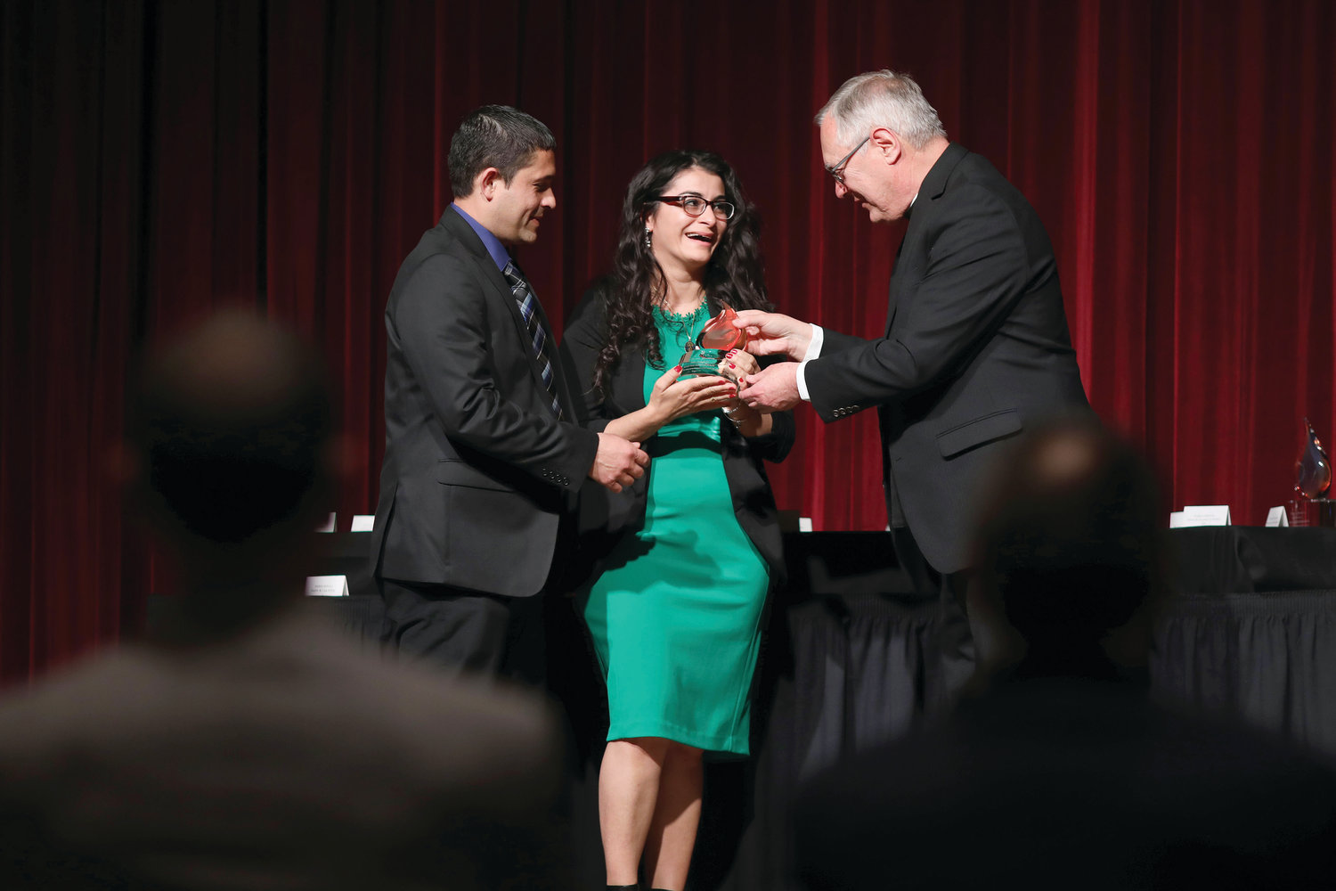 Bishop Thomas J. Tobin presents a Lumen Gentium Award to Sonia Aldana and Rony Morales in the category of Respect Life. The Morales are the parents of Baby Angela who was born with anencephaly and miraculously surpassed her initial medical prognosis at birth by living to the age of 3 years and 8 months. Since their daughter died in 2017 they have become strong advocates for life and for babies with disabilities.