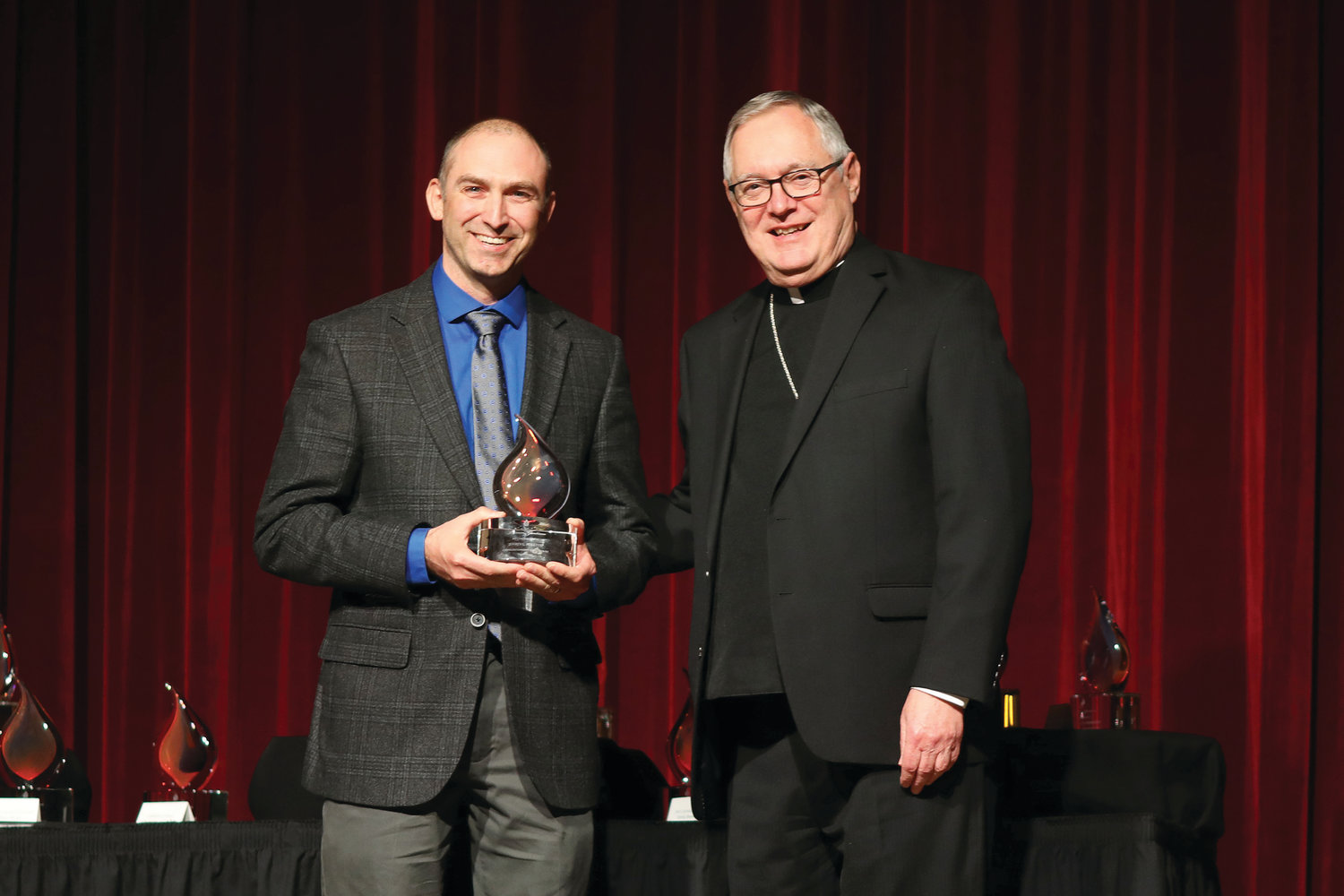 Jeffrey Pelletier is presented with an award in Parish Service.