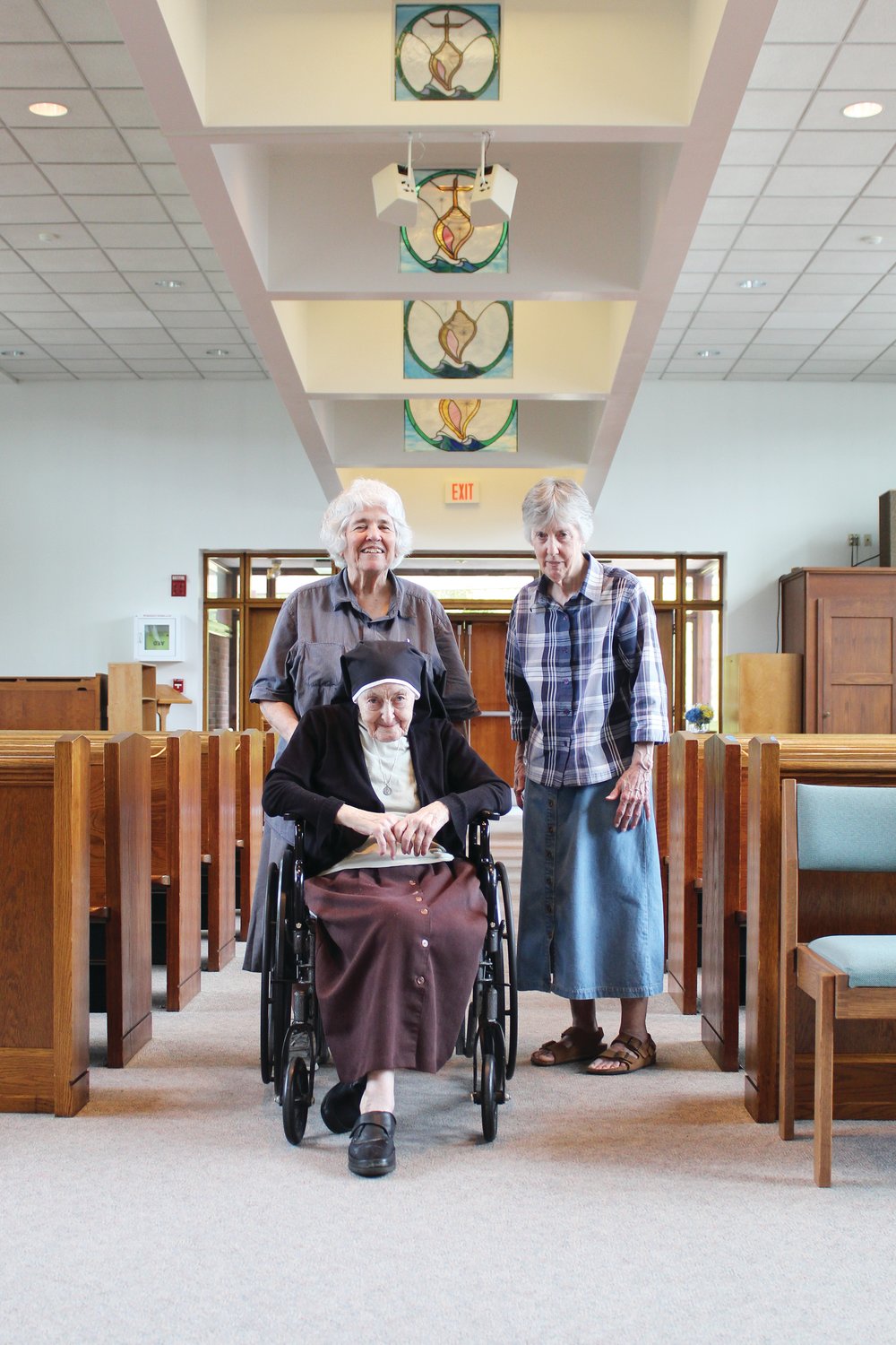 Standing from left, Sister Beth Shainin and Sister Sue Lumb, and Sister Patricia Keilty are three of the remaining six religious sisters of the Monastery of Our Lady of Mount Carmel and St. Therese in Barrington.