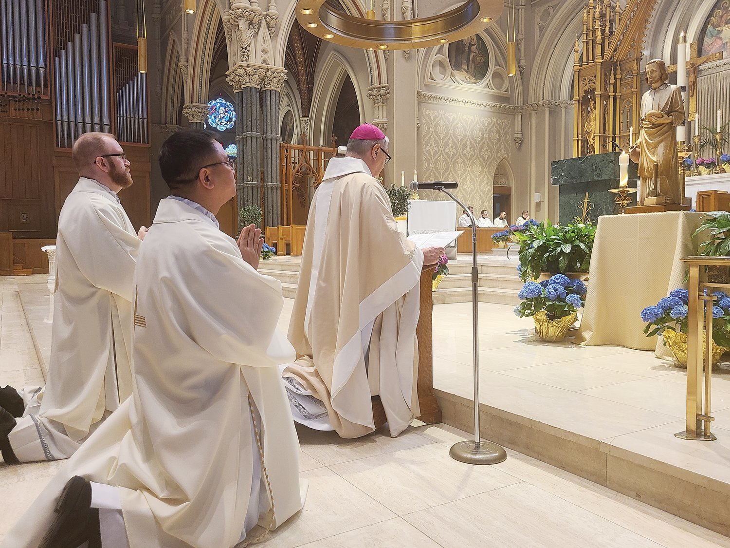 Bishop Thomas J. Tobin leads the Litany of St. Joseph during Mass at the Cathedral of Saints Peter and Paul to honor the memorial of St. Joseph the Worker on May 1.