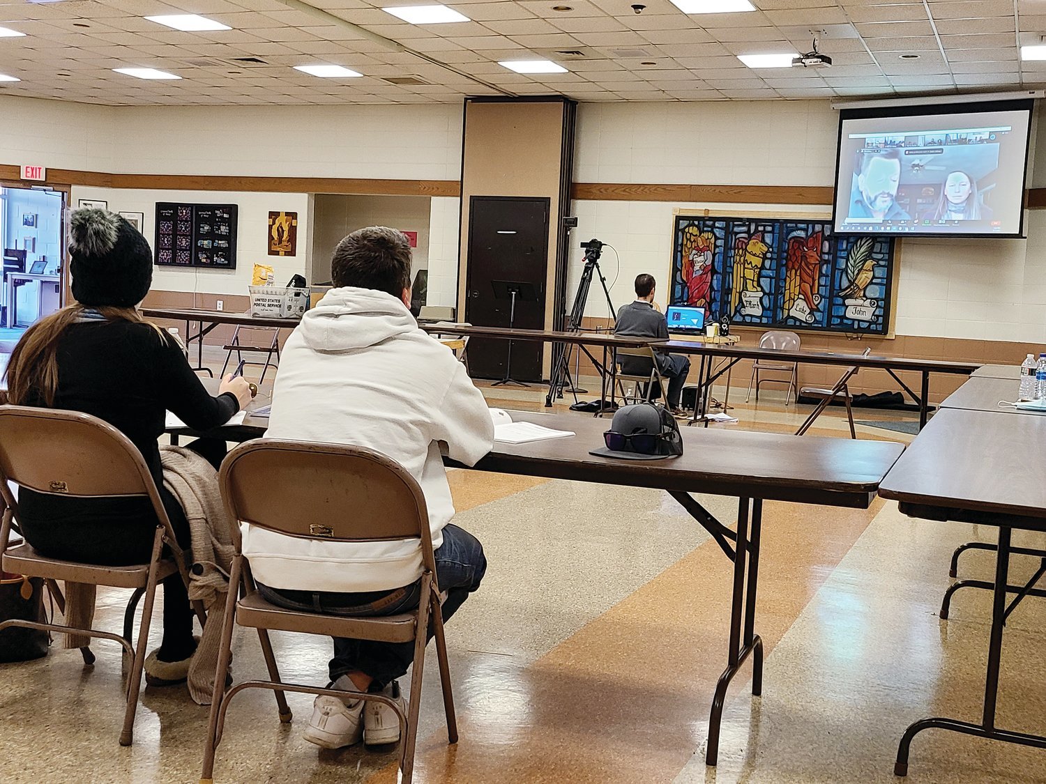 Engaged couples listen to a Zoom presentation during a weekend diocesan marriage preparation program at St. Francis de Sales Church in North Kingstown, organized by the diocesan Office of Marriage Preparation and Enrichment.
