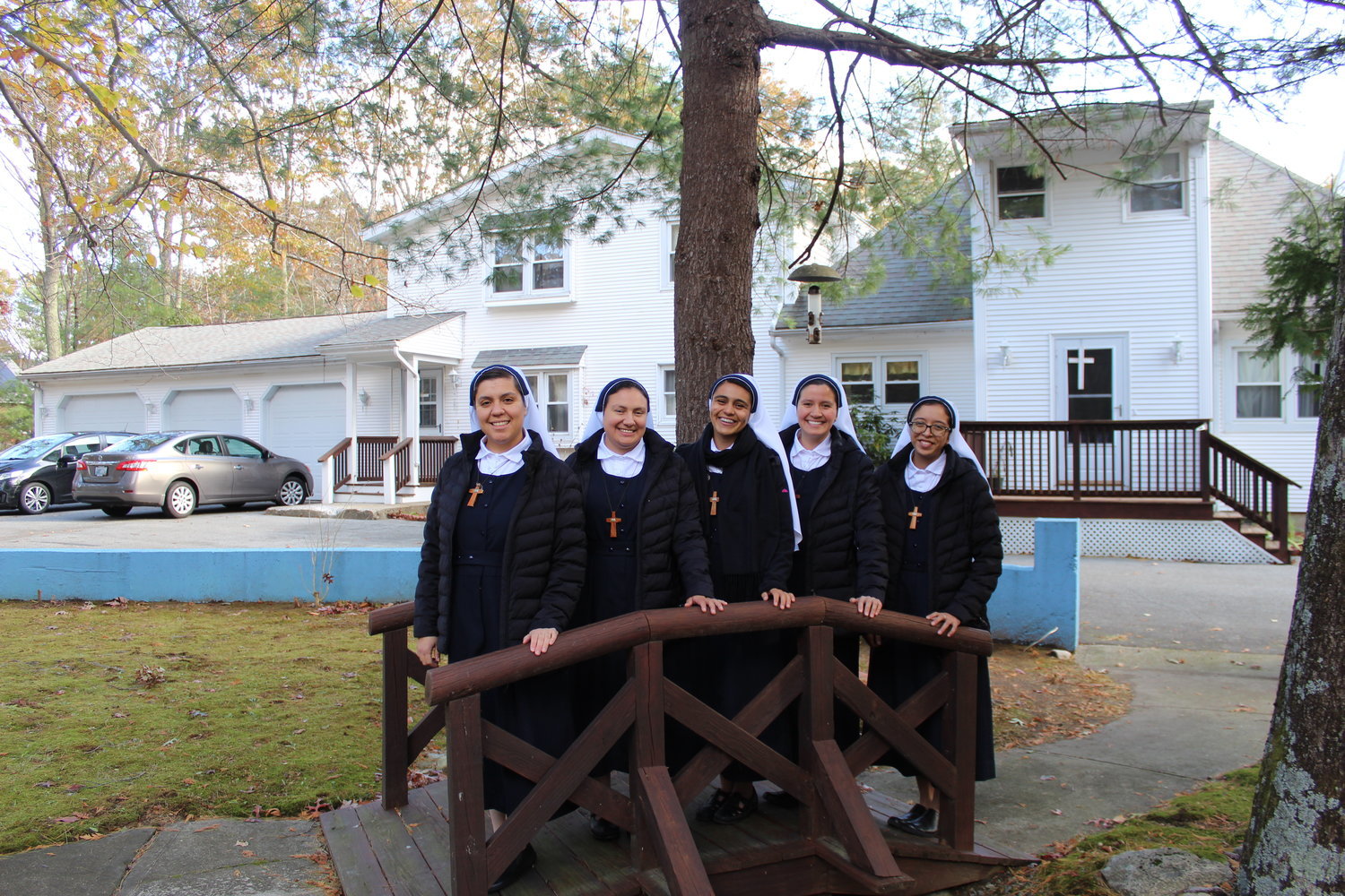ON A MISSION: From left, Sisters Veronica Sanchez, Wendy Palacios, Jessica Bernal, Cristina Gomez and Nancy Ortiz enjoy the grounds of the newly established novitiate of the Missionary Sisters, Servants of the Word who founded it as the first in the U.S. The sisters will spend the next year preparing for a ministry of evangelizing to the laity.