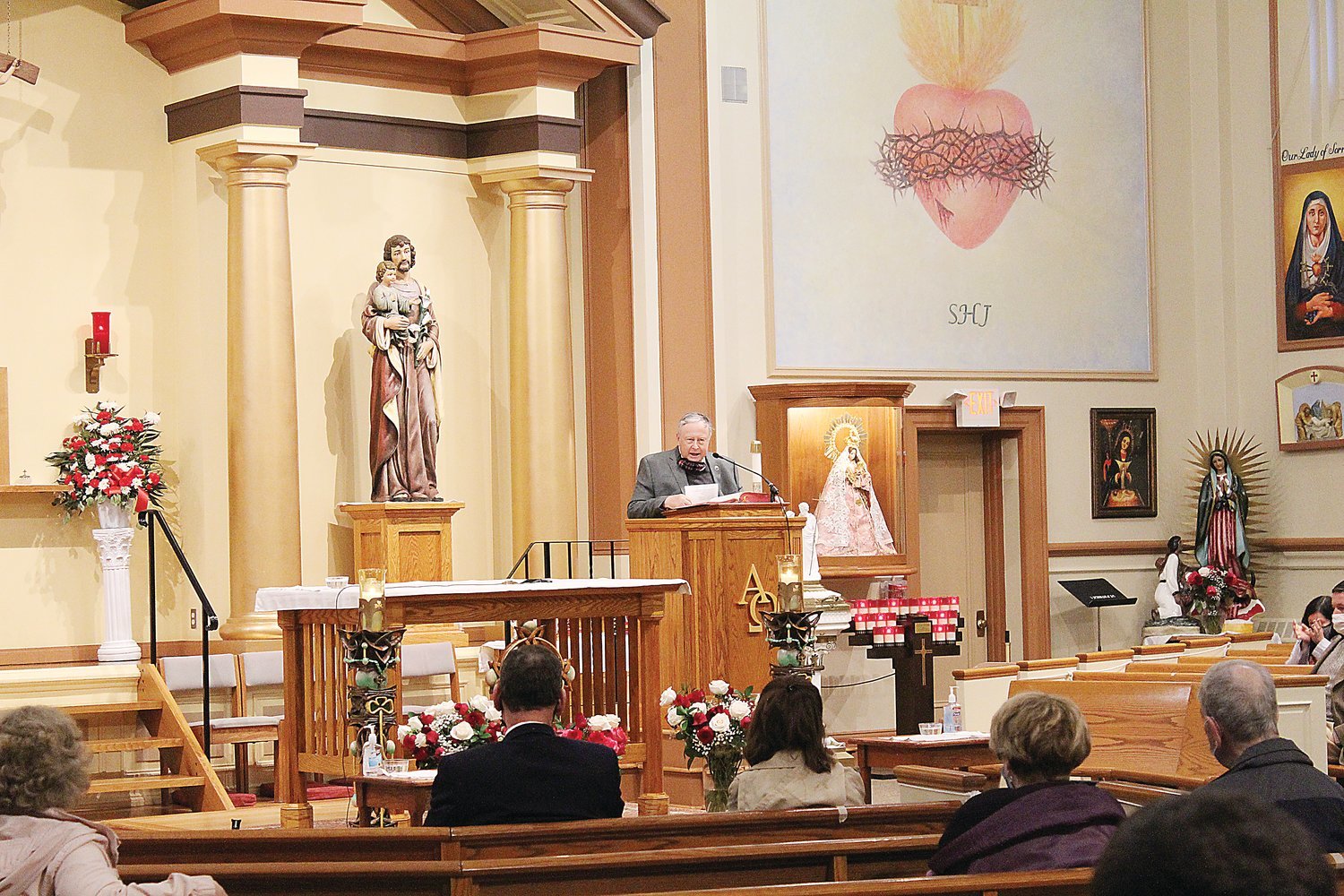 Dr. Daniel Harrop, president of the Rhode Island Catholic Medical Society, speaks during a Mass to honor the ministry of health care workers and to pray for those lost to COVID-19.