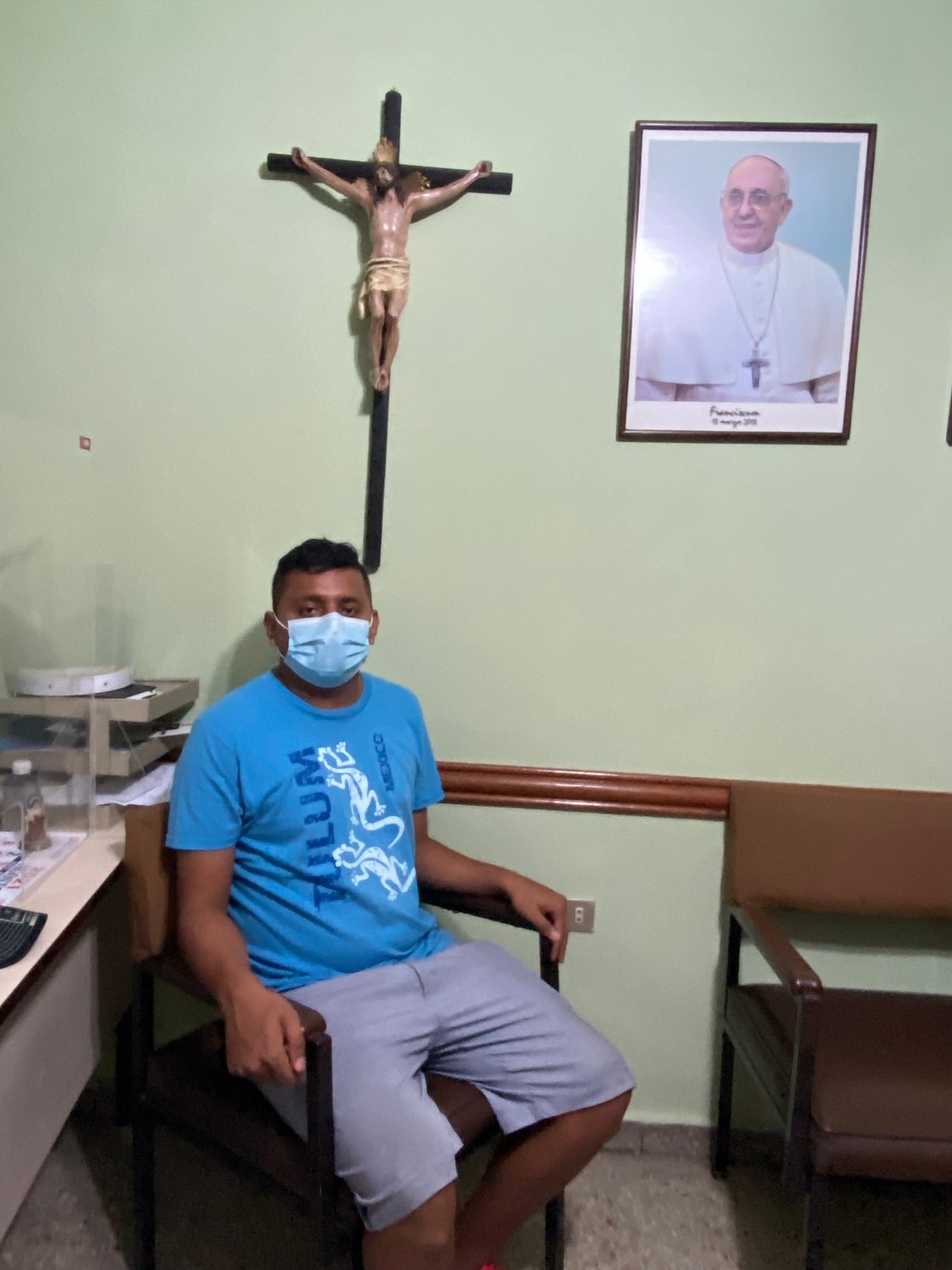 Jose Andres Martinez sits for an interview Aug. 17, 2021, at Our Lady of Mount Carmel Church in San Salvador, El Salvador. Martinez, a former sacristan, recently returned to his native El Salvador after six attempts to cross the U.S.-Mexico border. (CNS photo/Rhina Guidos)