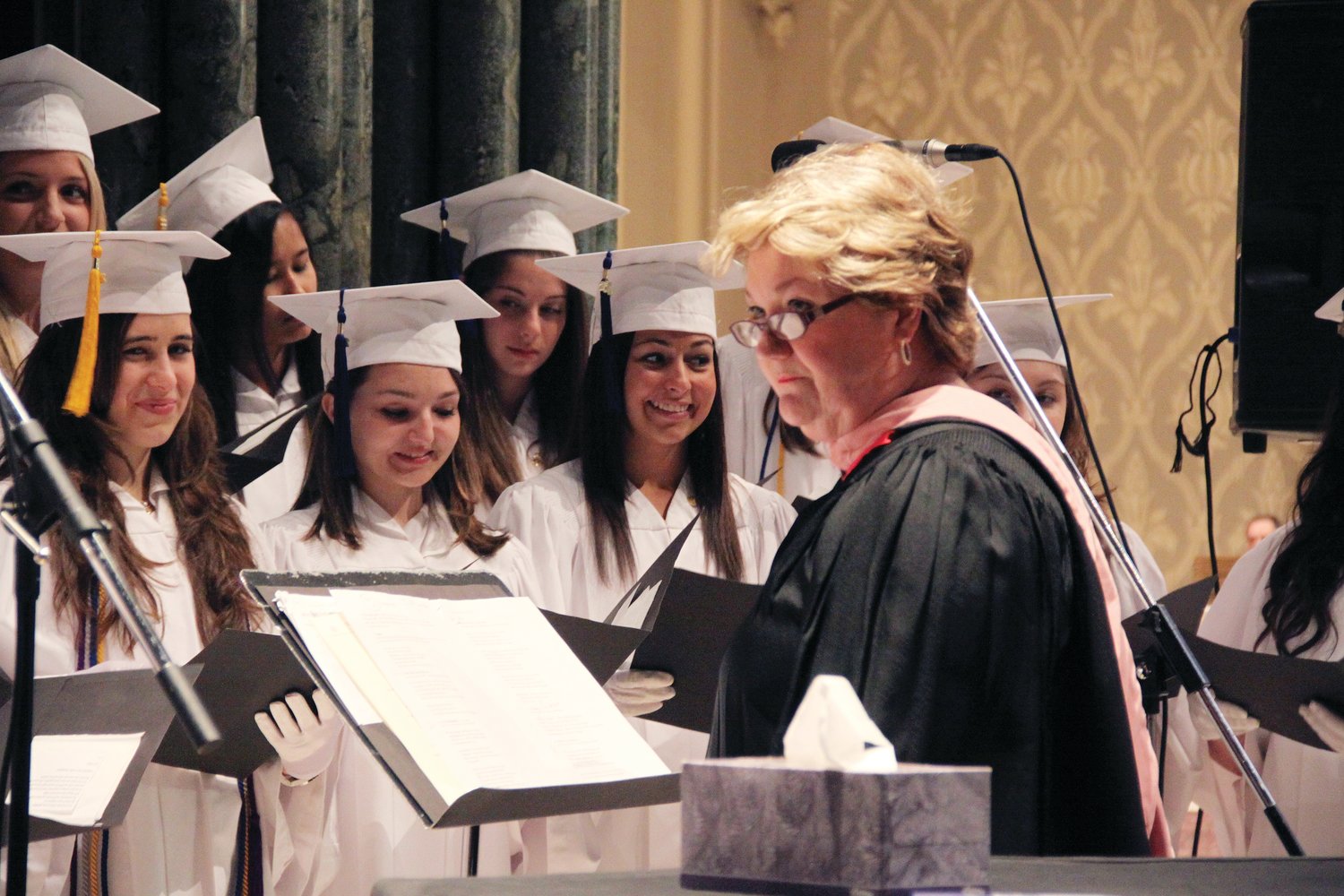 The Bay View Chorale, under the direction of Christine Kavanagh, pictured during the 2011 graduation at the Cathedral of Saints Peter and Paul, Providence. Kavanagh died peacefully on January 6, 2022 at her home. A Mass of Christian Burial was celebrated on January 15, 2022, in the cathedral.