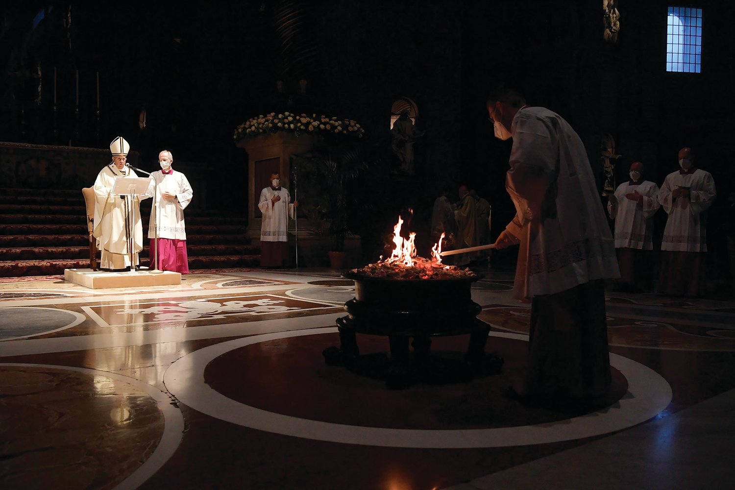 Pope Francis celebrates the Easter Vigil in St. Peter's Basilica at the Vatican April 3, 2021. In his homily, the pope said, "It is always possible to begin anew."