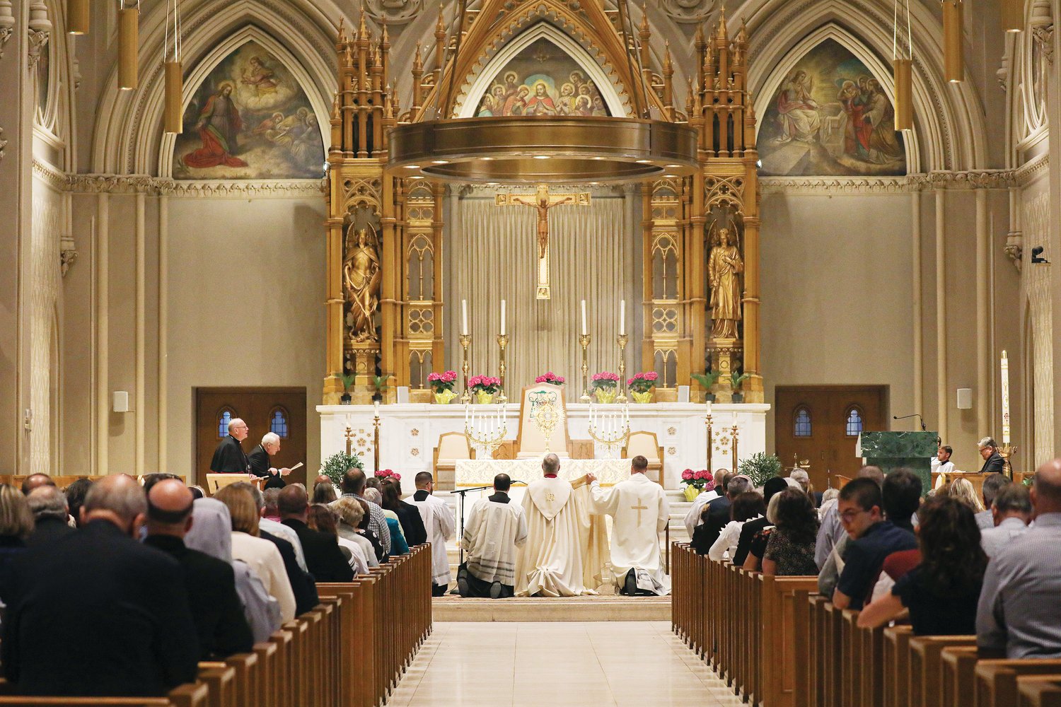 Hundreds join Bishop Thomas J. Tobin in prayer before the Blessed Sacrament on Sunday, May 15, 2022. The faithful filled the Cathedral of SS. Peter and Paul for Eucharistic Adoration as well as a talk by Cardinal Timothy M. Dolan, Archbishop of New York, in a major event held in celebration of the 150th anniversary of the Diocese of Providence.