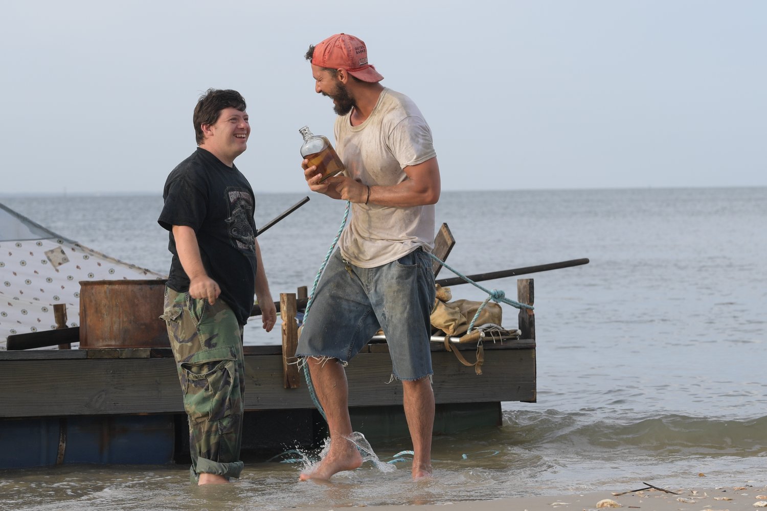 Zack Gottsagen and Shia LaBeouf star in a scene from the movie "The Peanut Butter Falcon." T