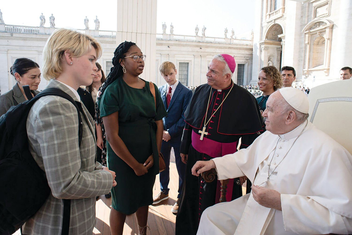 Olivia Marcoux, at left, a parishioner of Holy Trinity Church and a student at Mount Saint Charles Academy, was one of two selected to deliver a message about the concerns of youth in the United States in a face-to-face visit with Pope Francis on October 12 in Rome.