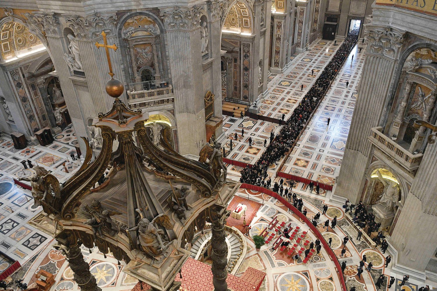 The body of Pope Benedict XVI lies in St. Peter's Basilica for public viewing at the Vatican Jan. 2, 2023.