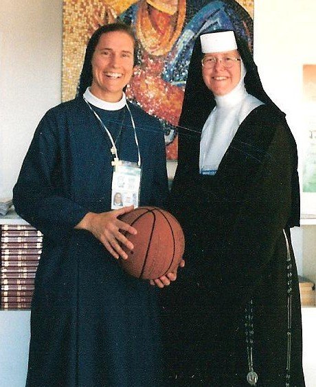 Sister Irene Regina of the Daughters of St. Paul, and Sister Margaret Ann Laechelin, of the Carmelites of the Most Sacred Heart of Los Angeles, shared their story of basketball, friendship and religious vocation at the 2002 World Youth Day in Toronto. They especially recalled one special moment when they both sat before the tabernacle in the dimly lit college chapel one evening after practice and prayed together.