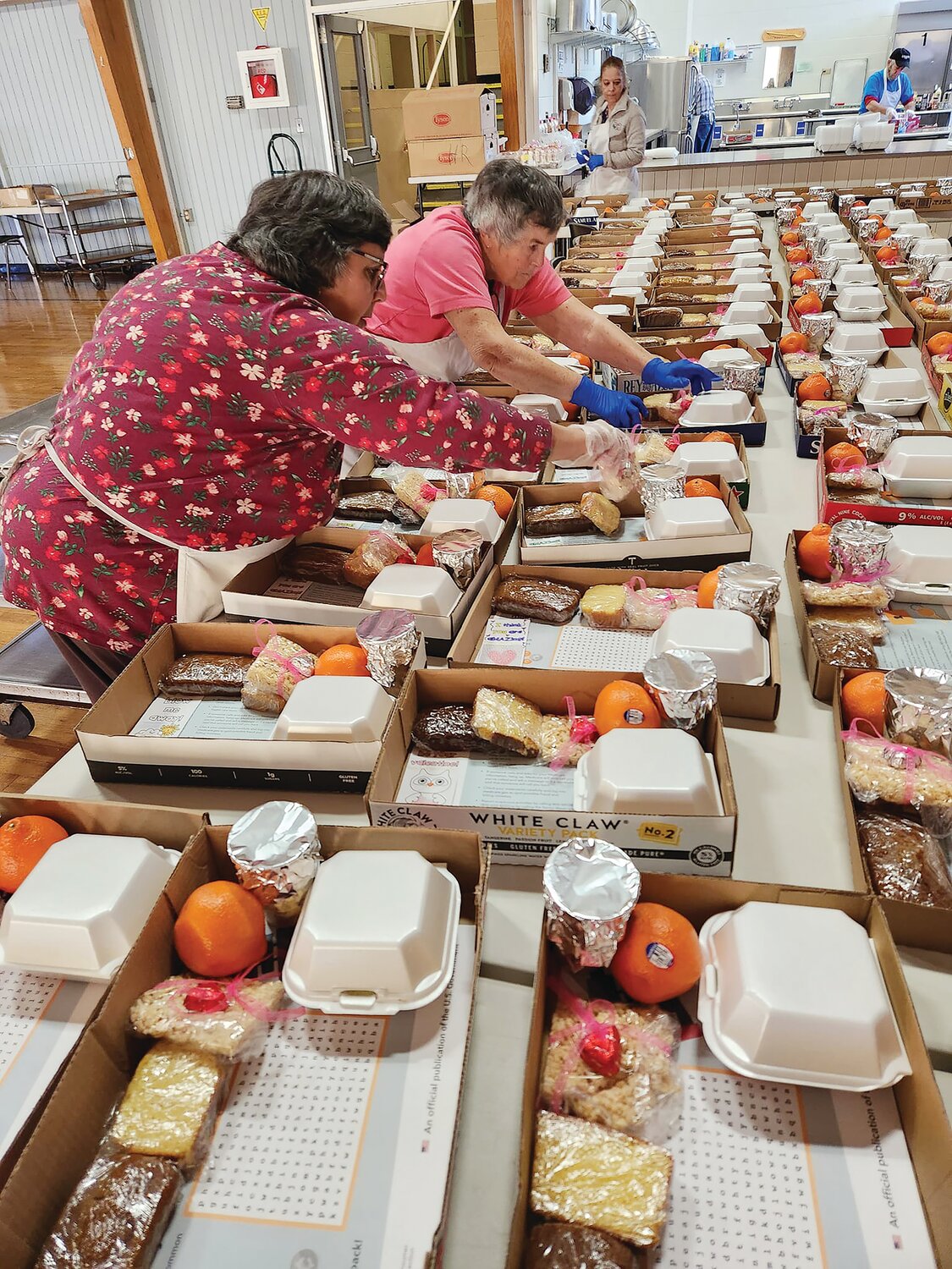 In their cooking, serving, packaging, delivering, dedicated volunteers are helping the West Bay one meal at a time.